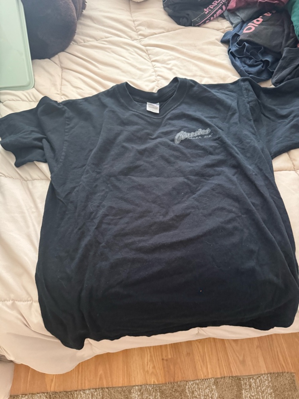 Men's Black Crew Neck T-Shirt with Subtle Chest Logo